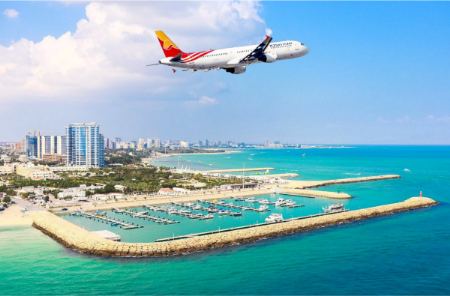 A-Top-View-Of-Kish-Island-And-An-Earplane-Passing-Through-The-Sky-